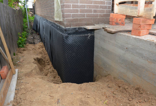 Happy homeowners after waterproofing job in Hatfield
